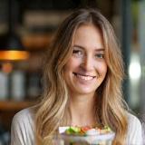 Sophie smiling with healthy lunch